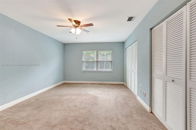 sitting room with a wealth of natural light and hardwood / wood-style flooring