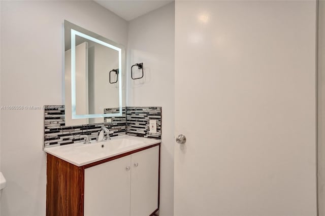 850 N Miami Ave Unit W-1810, Miami, FL 33136 - bathroom featuring decorative backsplash and vanity