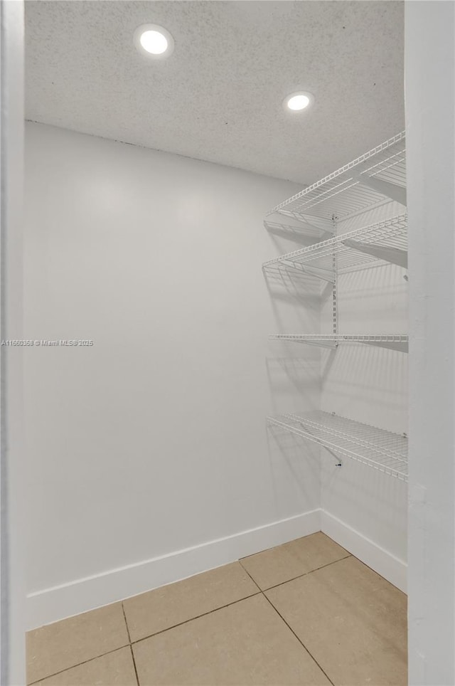 850 N Miami Ave Unit W-1810, Miami, FL 33136 - walk in closet with light tile patterned floors