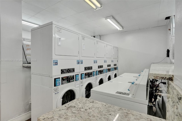 850 N Miami Ave Unit W-1810, Miami, FL 33136 - shared laundry area featuring washing machine and dryer and stacked washing maching and dryer
