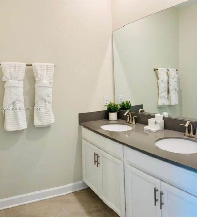 bathroom featuring vanity and tile patterned floors