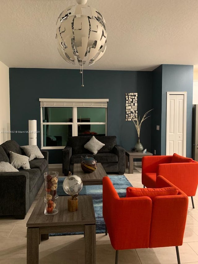 tiled living room with a textured ceiling