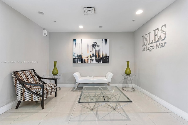 sitting room featuring tile patterned floors