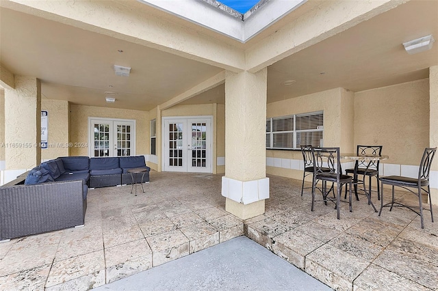 view of patio with french doors and an outdoor hangout area