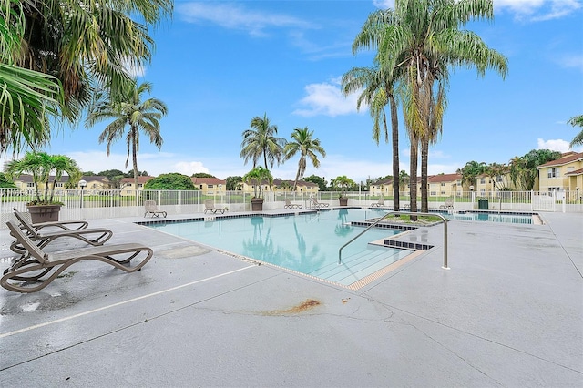 view of pool featuring a patio