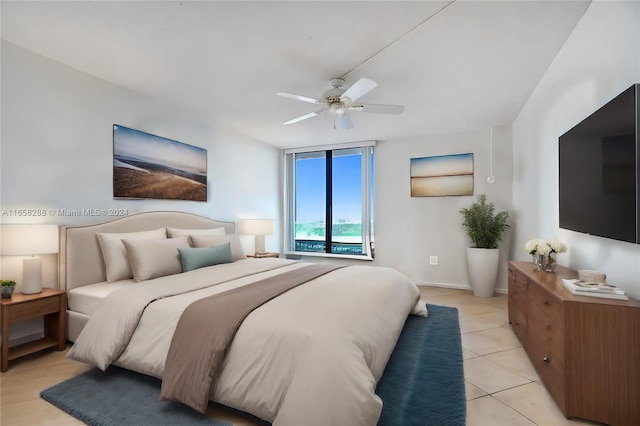 bedroom featuring ceiling fan and light tile patterned floors