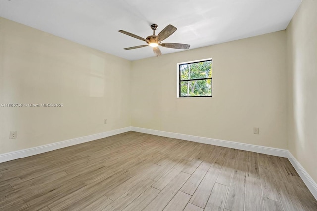 unfurnished room with light hardwood / wood-style flooring and ceiling fan