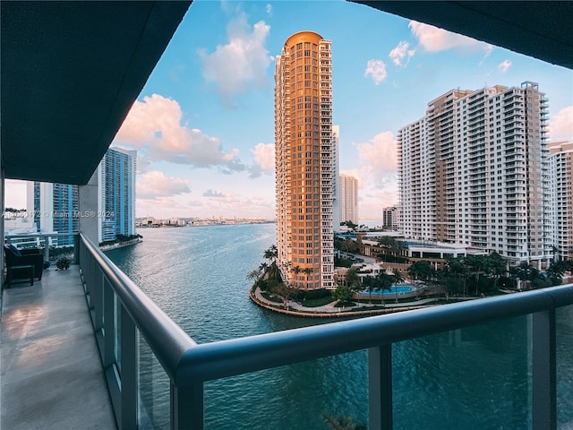 balcony featuring a water view