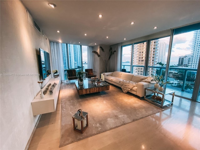 living room with floor to ceiling windows