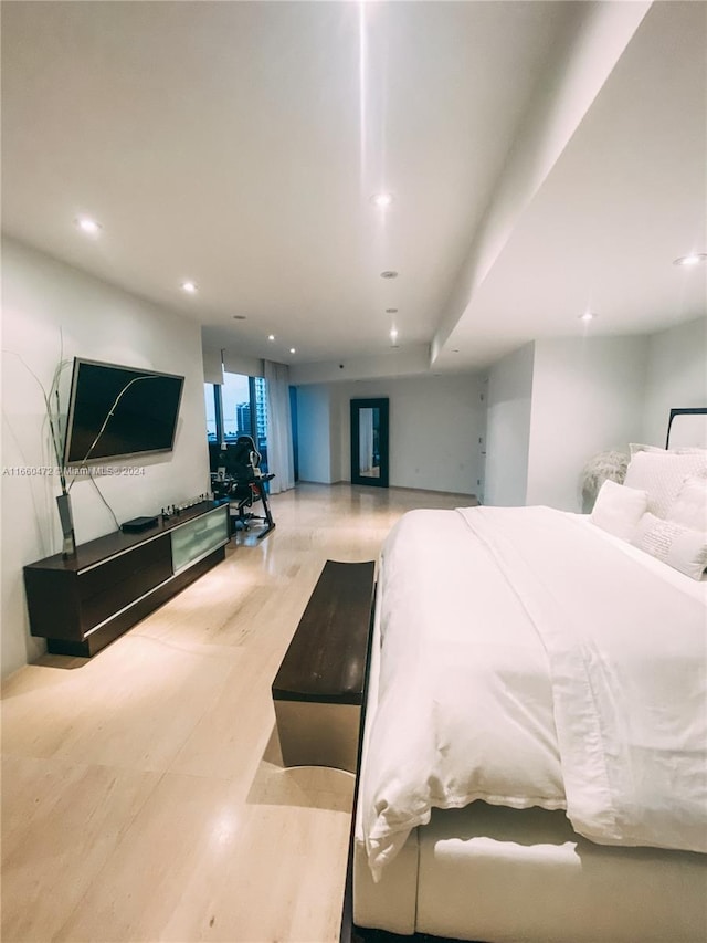 bedroom with light wood-type flooring