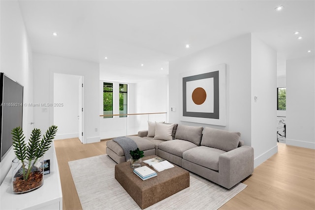 7001 SW 71st Ave, Miami, FL 33143 - living room with plenty of natural light, light wood-type flooring, recessed lighting, and baseboards