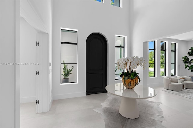 7001 SW 71st Ave, Miami, FL 33143 - entryway featuring a high ceiling and baseboards