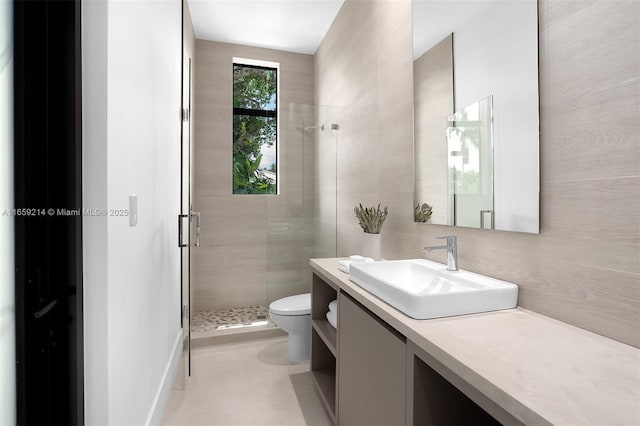 7001 SW 71st Ave, Miami, FL 33143 - bathroom with a stall shower, toilet, vanity, and tile walls