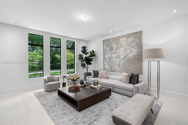 7001 SW 71st Ave, Miami, FL 33143 - tiled living room with recessed lighting and baseboards