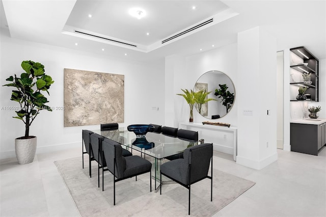 7001 SW 71st Ave, Miami, FL 33143 - dining room featuring a raised ceiling, an AC wall unit, recessed lighting, and baseboards