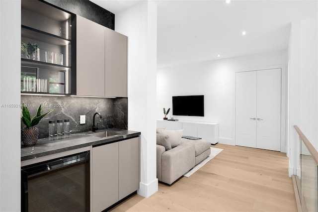7001 SW 71st Ave, Miami, FL 33143 - indoor wet bar featuring wine cooler, light wood-style floors, backsplash, and recessed lighting