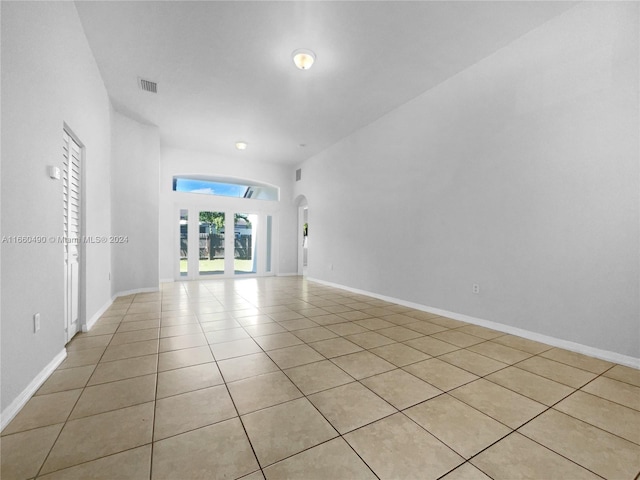 empty room featuring light tile patterned flooring