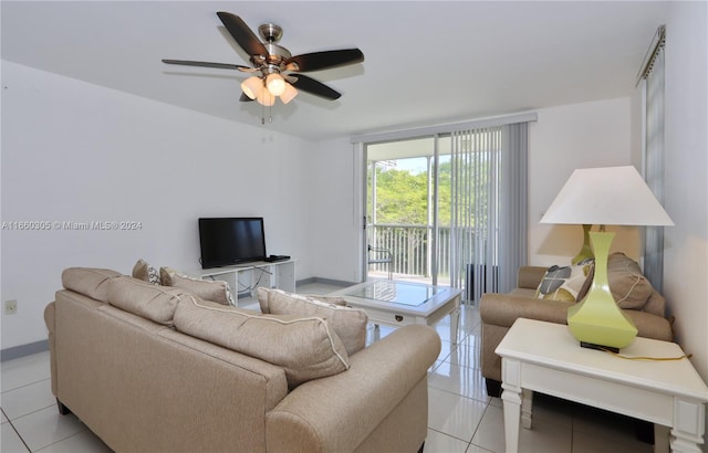 tiled living room featuring ceiling fan