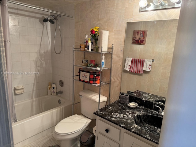 full bathroom with shower / tub combo, vanity, and toilet