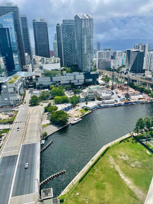 aerial view with a view of city and a water view