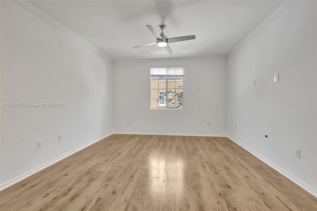 unfurnished room with ceiling fan, light wood-type flooring, and ornamental molding