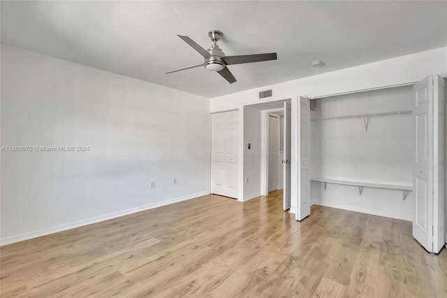 unfurnished bedroom featuring ceiling fan and light hardwood / wood-style floors