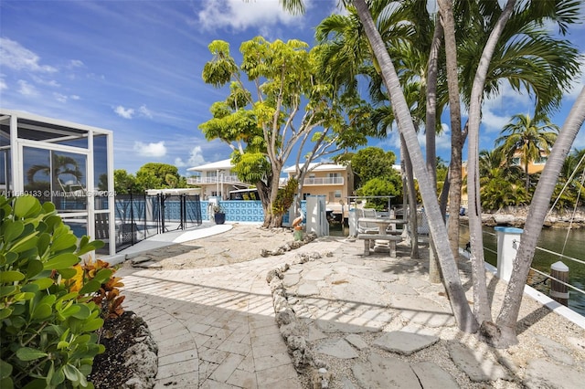 view of patio featuring a water view