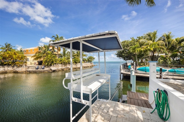 dock area featuring a water view