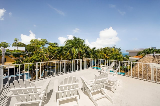 view of patio featuring a water view