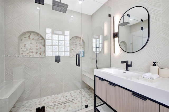 bathroom with vanity and walk in shower