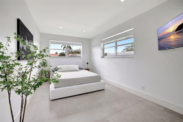 bedroom with concrete flooring