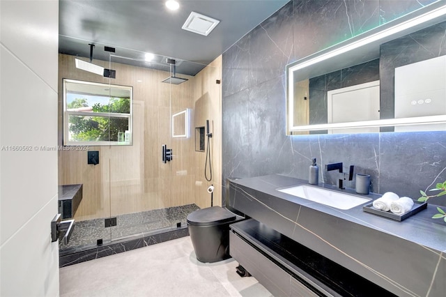 bathroom featuring a shower, tile walls, toilet, and vanity