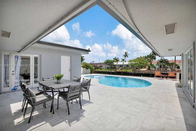 view of pool featuring a patio