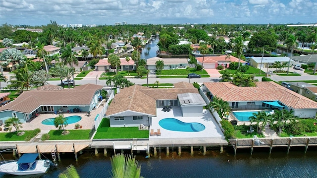 drone / aerial view with a water view