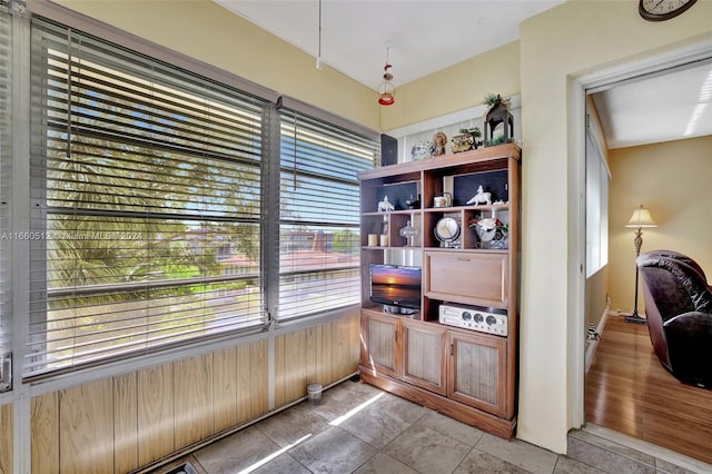 interior space with hardwood / wood-style flooring and plenty of natural light