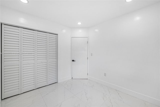 unfurnished bedroom featuring a closet