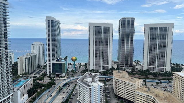 property's view of city featuring a water view