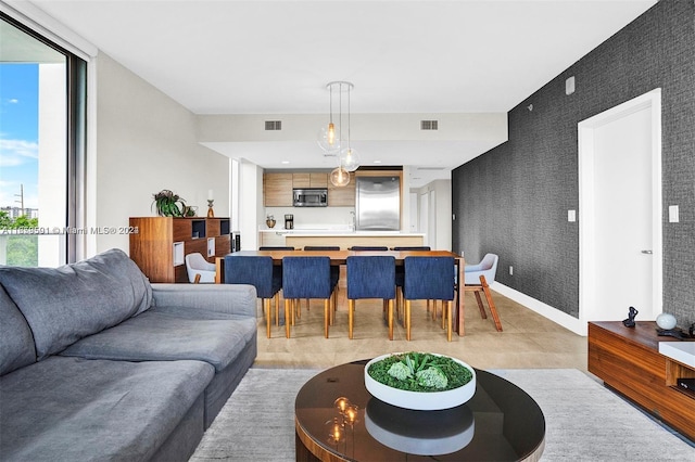 16385 Biscayne Blvd Unit 421, North Miami Beach, FL 33160 - living area with plenty of natural light