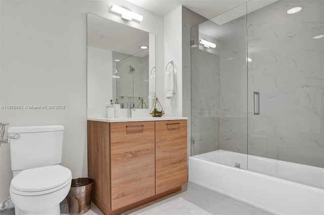 16385 Biscayne Blvd Unit 421, North Miami Beach, FL 33160 - full bathroom featuring marble look tiles, toilet, vanity, and shower / bath combination with glass door