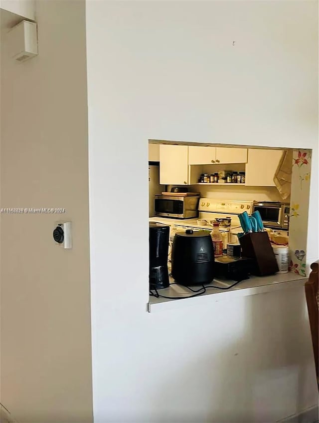 kitchen with cream cabinets