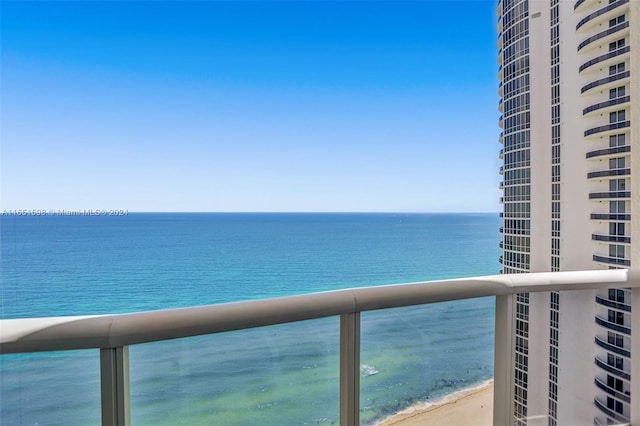 view of water feature with a beach view