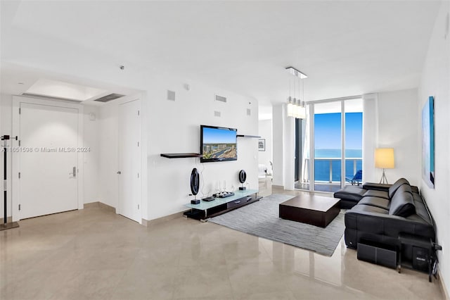 living room with floor to ceiling windows