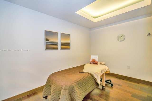 bedroom with wood-type flooring