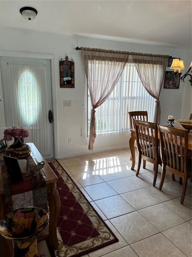 tiled foyer featuring plenty of natural light