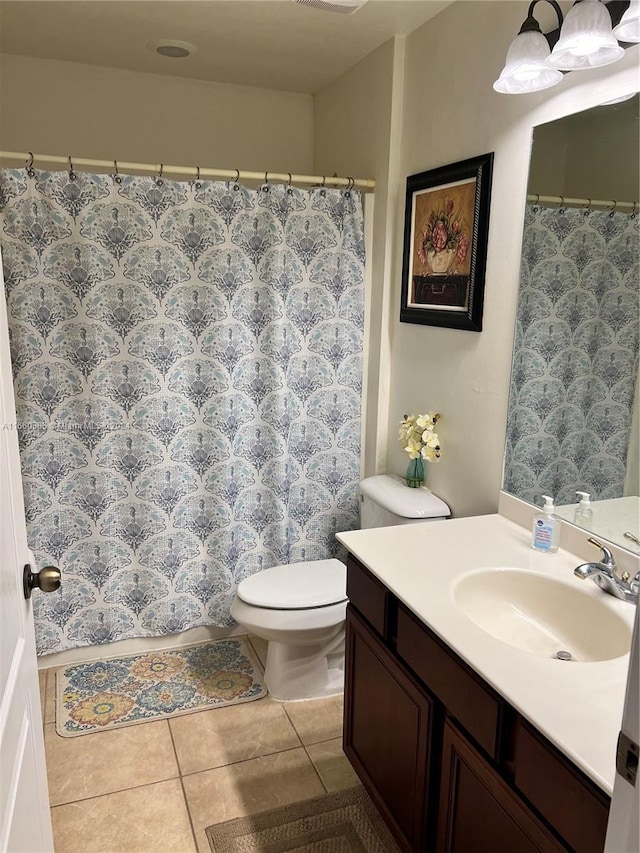 22 NW 17th Pl, Cape Coral, FL 33993 - full bathroom with toilet, tile patterned flooring, and vanity