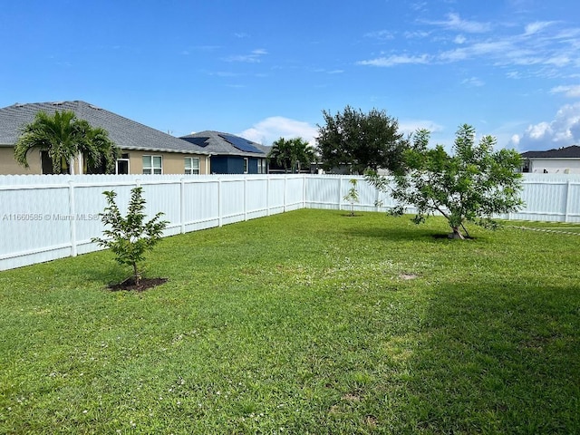 22 NW 17th Pl, Cape Coral, FL 33993 - view of yard featuring a fenced backyard