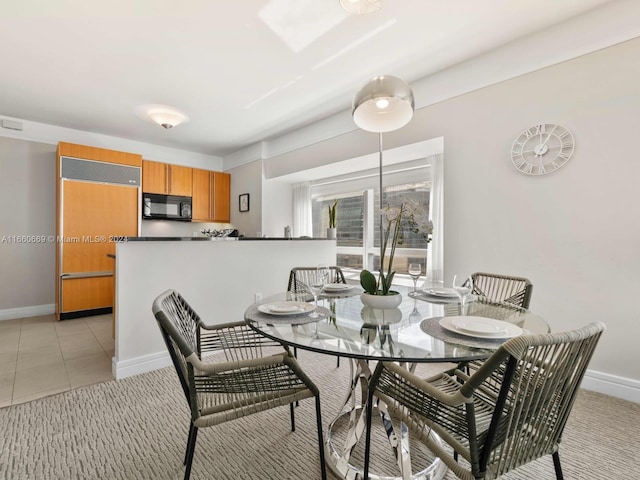 1435 Brickell Ave Unit 3212, Miami, FL 33131 - dining area featuring baseboards and light tile patterned floors