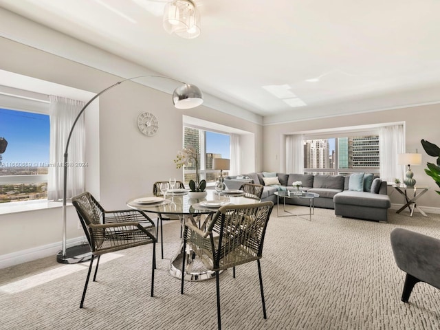 view of carpeted dining area