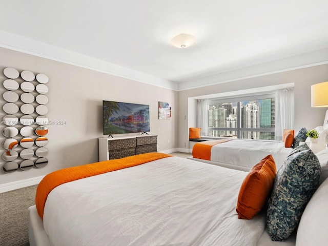 1435 Brickell Ave Unit 3212, Miami, FL 33131 - carpeted bedroom featuring baseboards