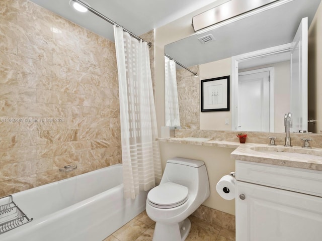 full bathroom with shower / bath combination with curtain, vanity, toilet, and tile patterned floors